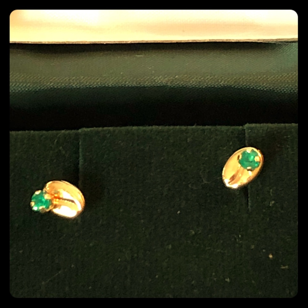 Colombian emerald and gold earrings.